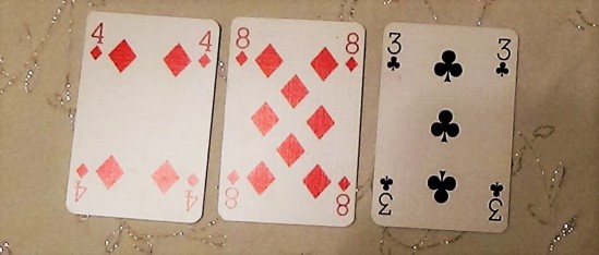 playing-cards-spread-showing-building